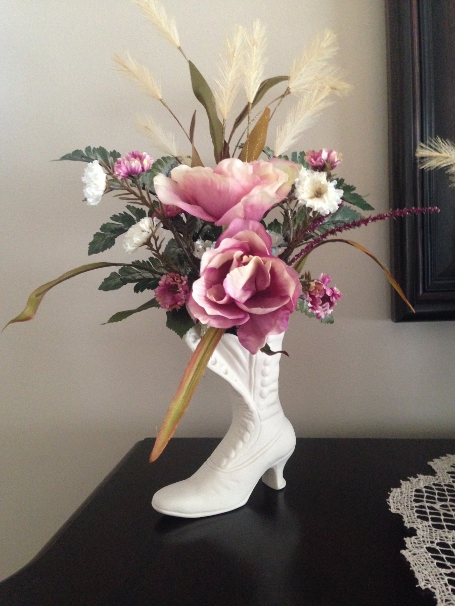 Roses in old-fashioned shoe